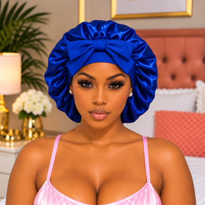Woman wearing cobalt British Virgin Islands satin bonnet with tie band bow