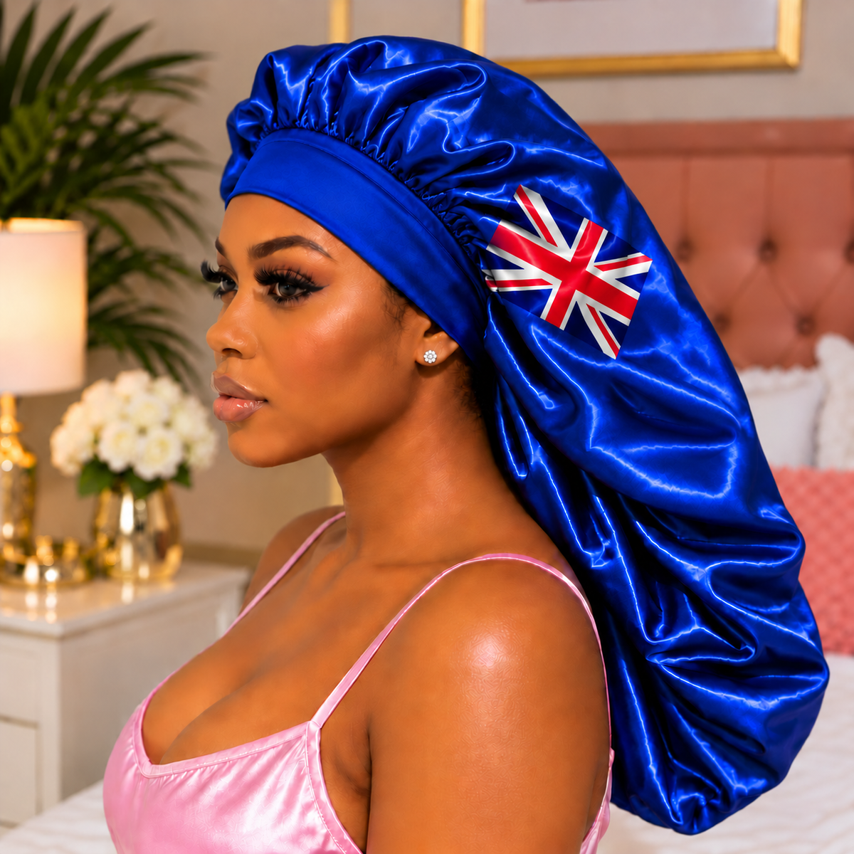 Woman wearing royal blue British Virgin Islands satin bonnet